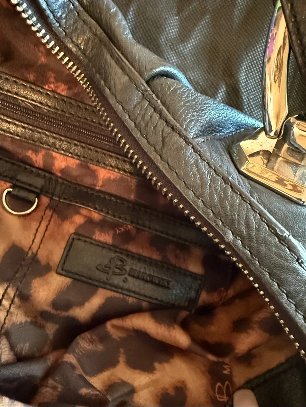 B. Makowsky Black Leather Hobo Bag with heavy silver hardware